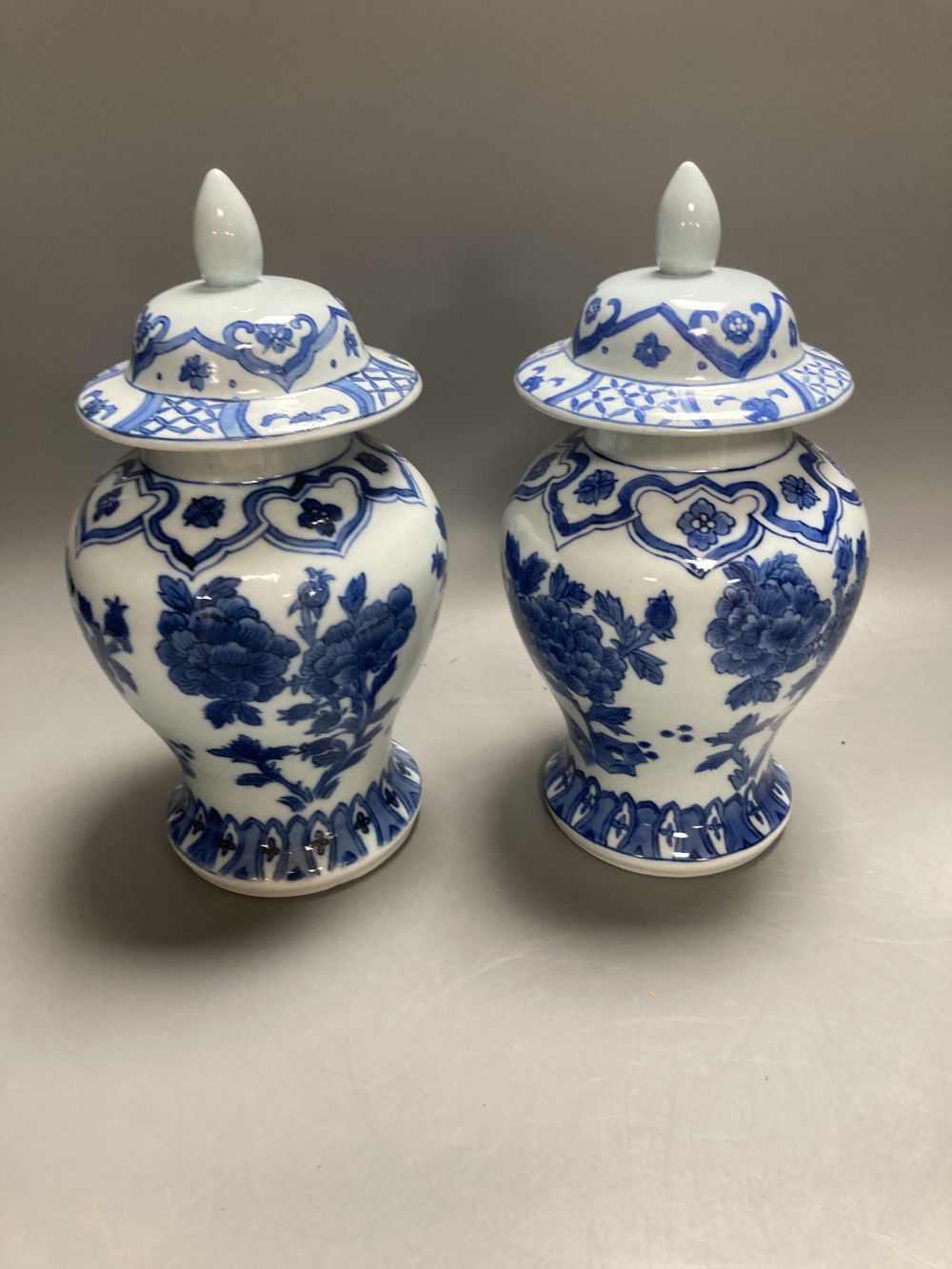 A Chinese famille rose dessert dish, 27cm, assorted Chinese blue and white porcelain and a delft ware hanging candle lantern, 26cm